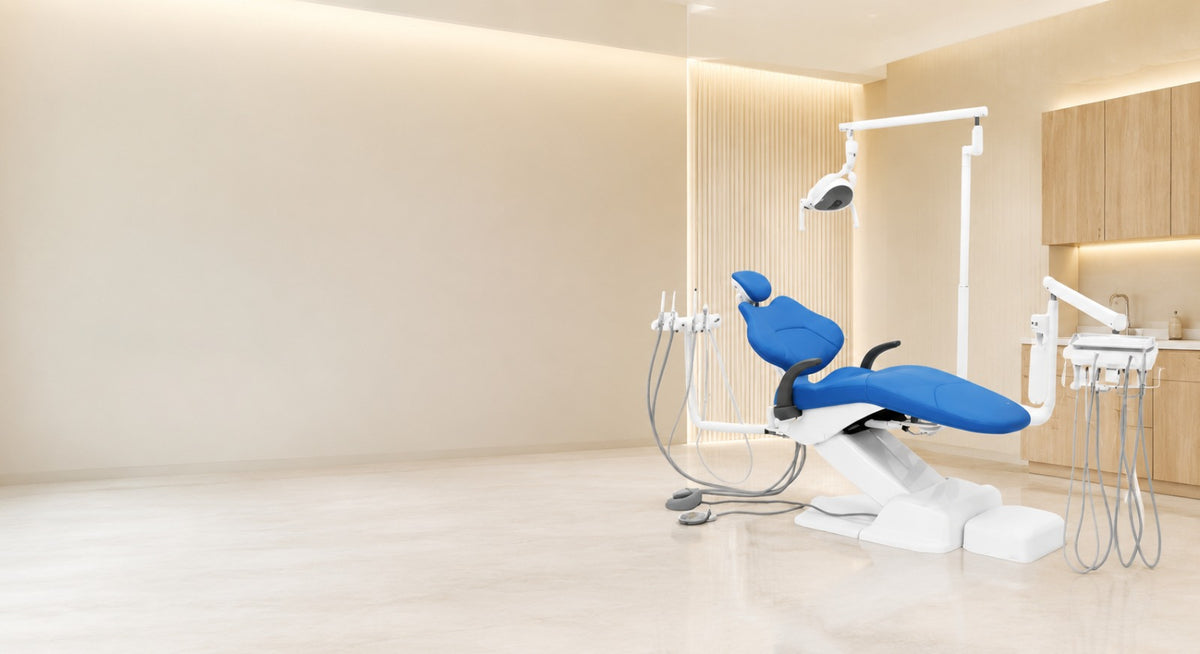 Dental operatory equipped by DRM Dental: patient chair, delivery system, and overhead operatory light
